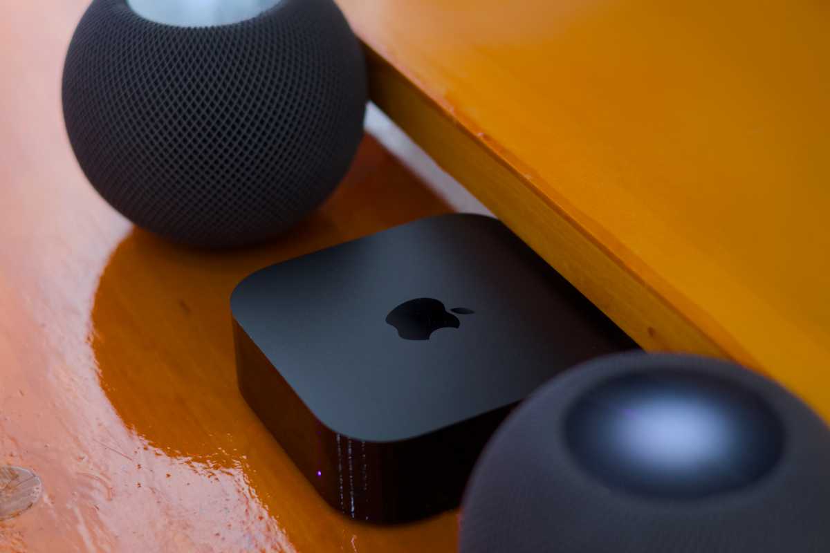 Apple TV 4K between HomePod mini stereo pair