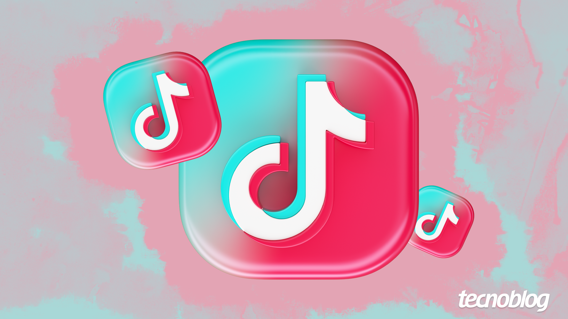 Imagem exibe tr&ecirc;s &iacute;cones 3D do TikTok, que flutuam sobre um fundo rosa e azul claro. O &iacute;cone principal, ao centro, &eacute; grande, com o s&iacute;mbolo musical branco em fundo vermelho e bordas azuis. Dois &iacute;cones menores, com as mesmas cores, est&atilde;o nas laterais. No canto inferior direito, o logo "tecnoblog".