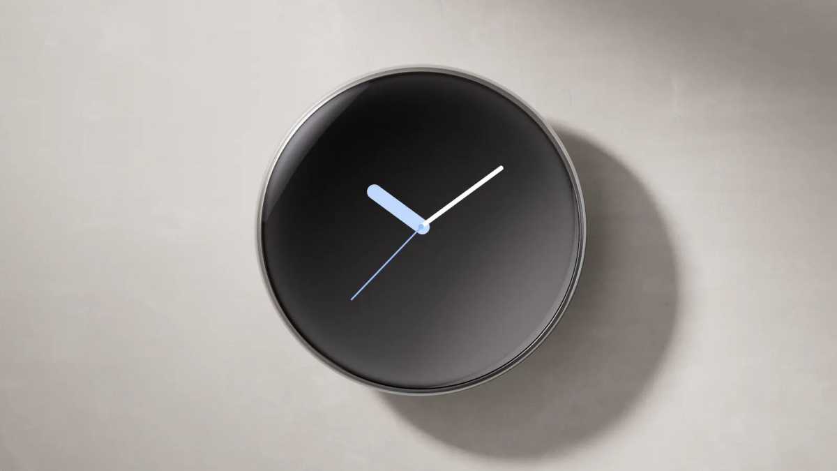 The thermostat displaying a clock face