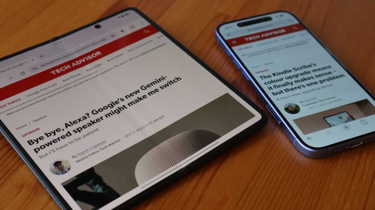 The Honor Magic V5 next to the iPhone 16