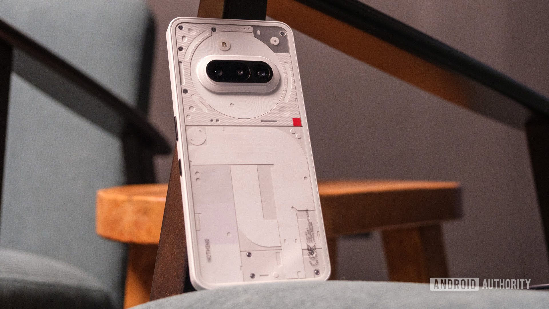 Nada Telefone 3a inclinado na cadeira