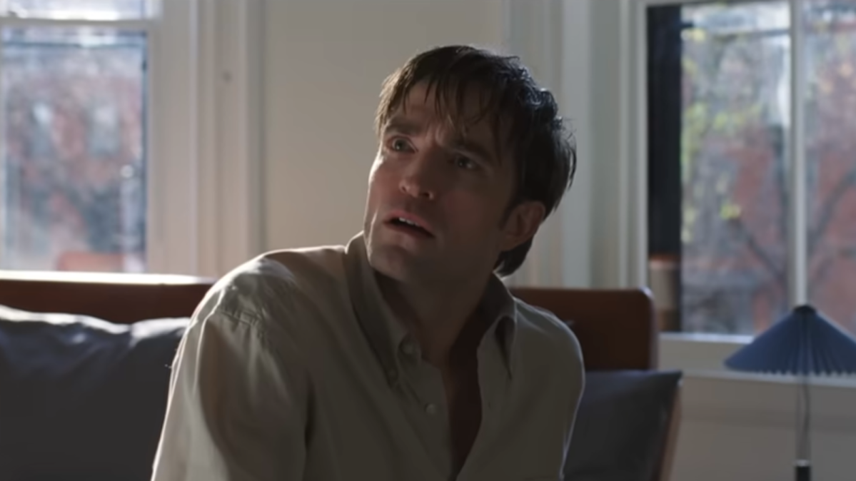 Screenshot from The Drama teaser, showing Robert Pattinson looking shocked