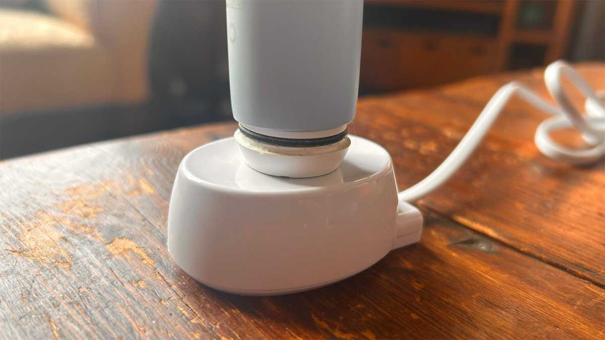 Using charger to unscrew the iO's base